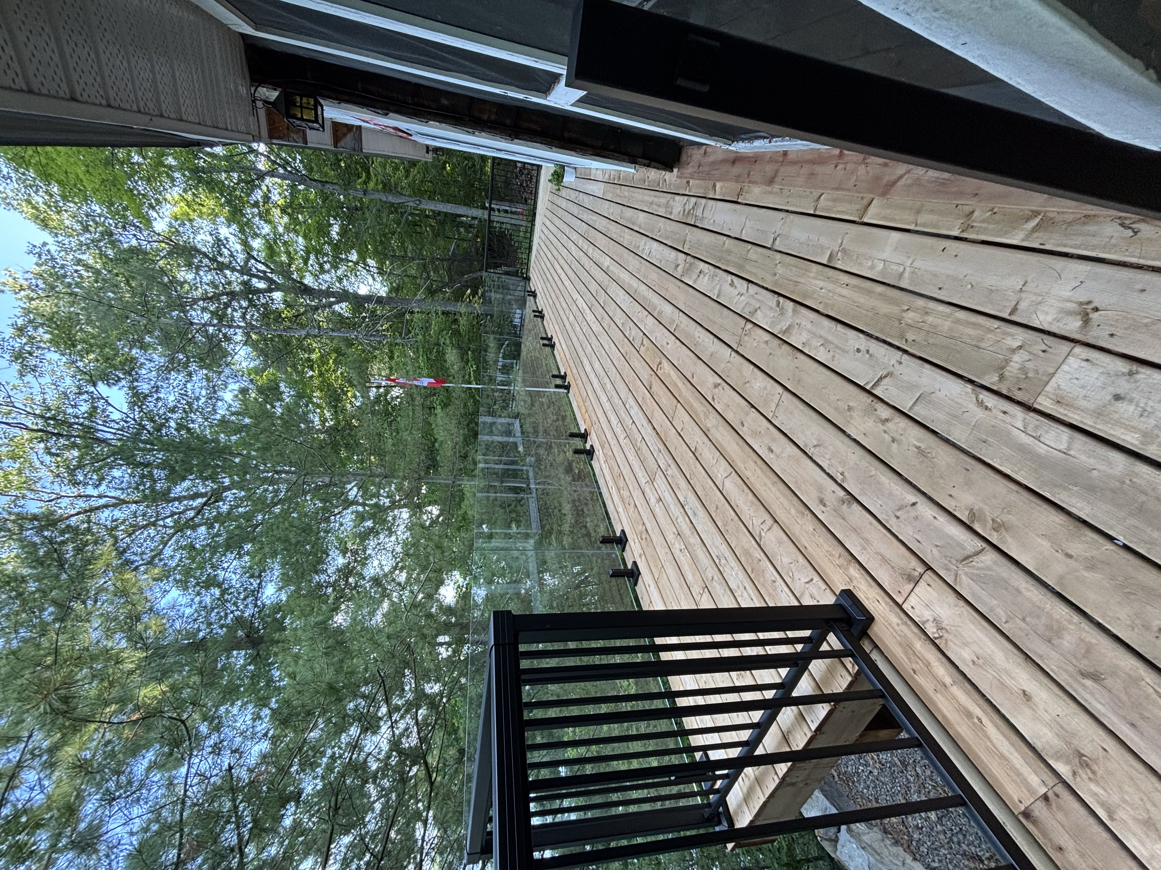 Glass railing on custom deck