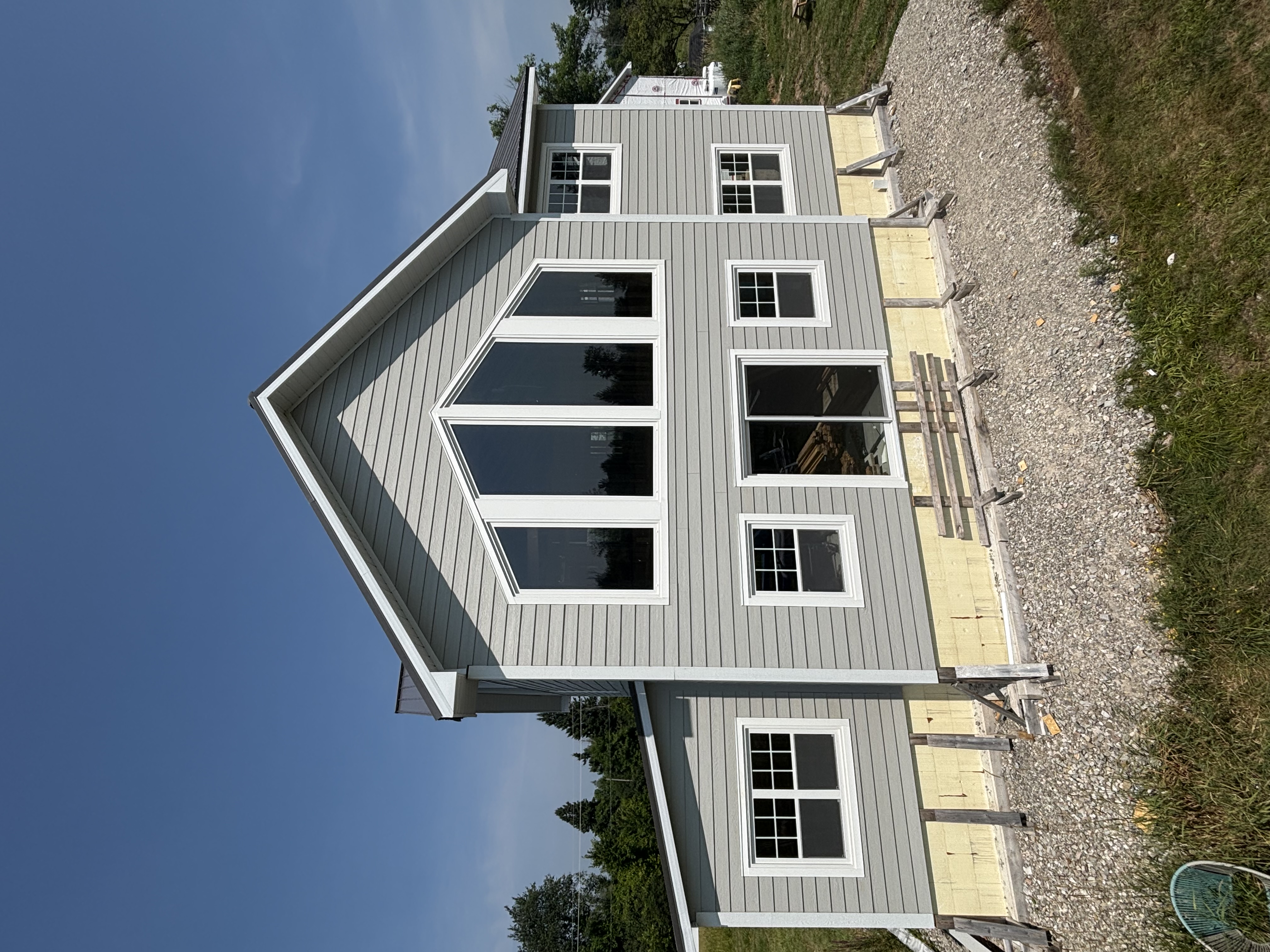 Custom gray home with large windows